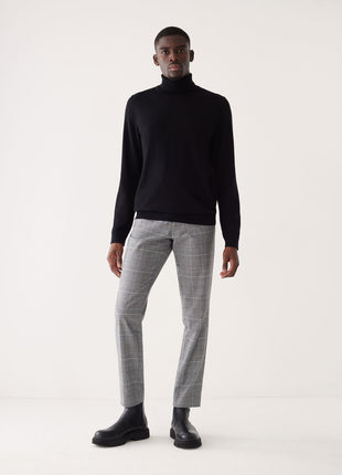 The Merino Wool Turtleneck Sweater in Black